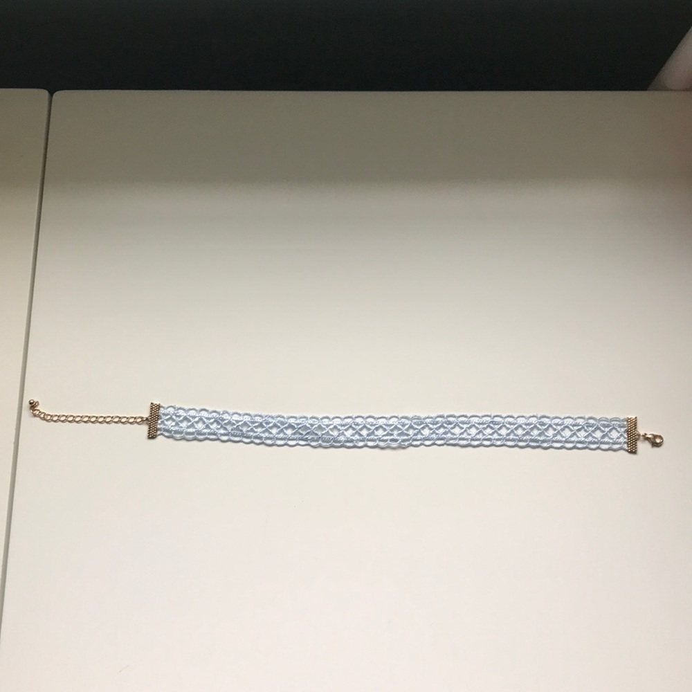 Blue choker.